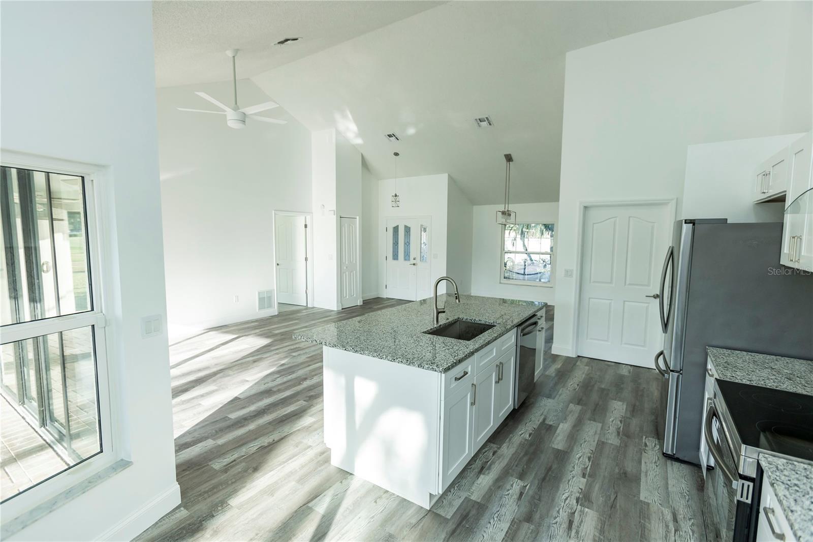 Kitchen Great Room Living Room view from Dining area