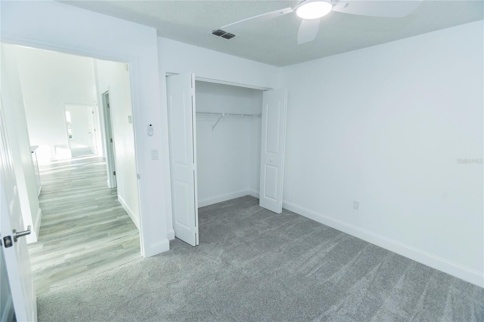 Inside Bedroom 1 view into hall to Great Room