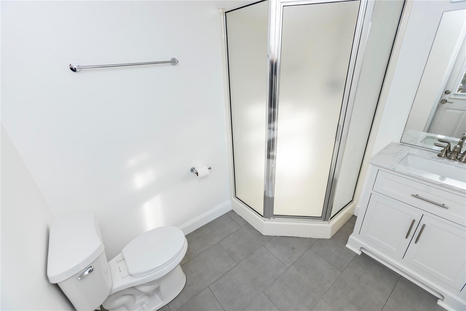 Pool Bathroom, entrance from RV Garage and Pool Deck