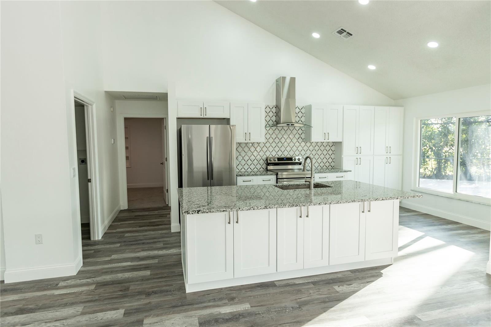 Kitchen view fr left of front door