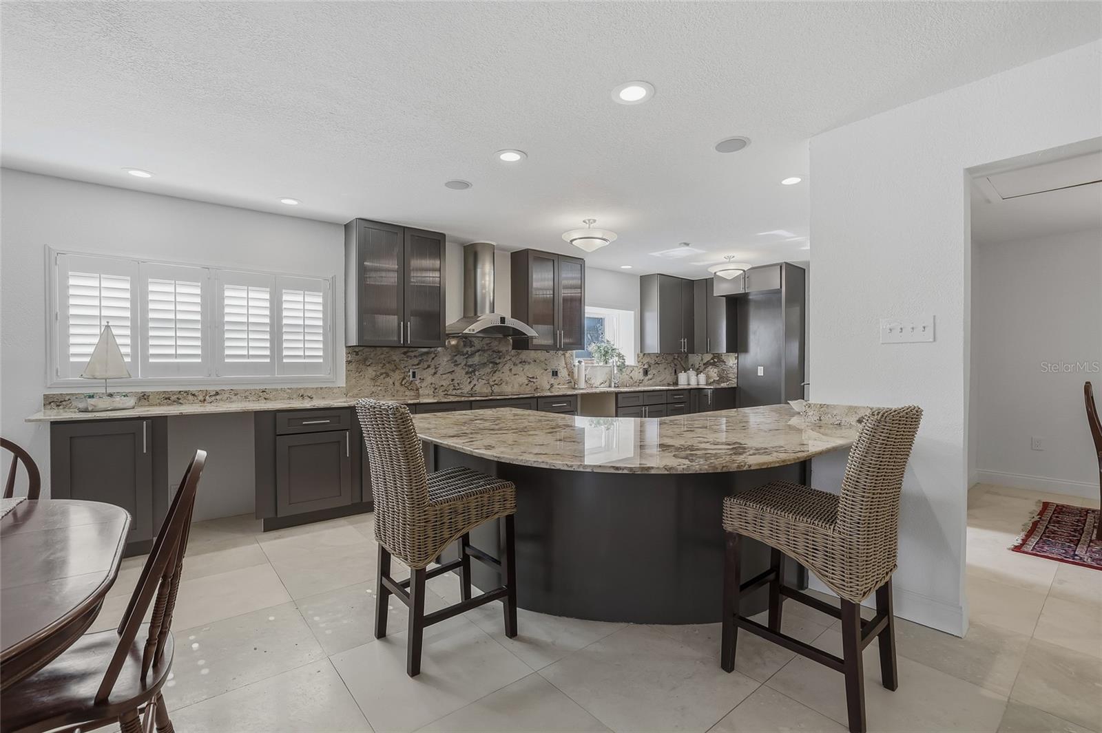 Kitchen with Peninsula Bar and Breakfast Area