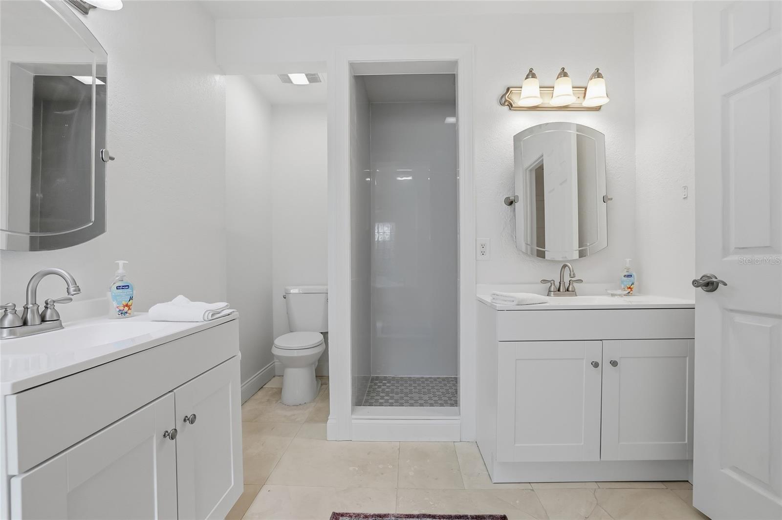Primary Bathroom, Dual Vanities with Walk-In Shower