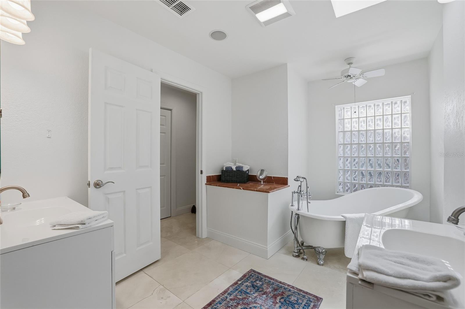 Primary Bathroom, Dual Vanities with Clawfoot Tub