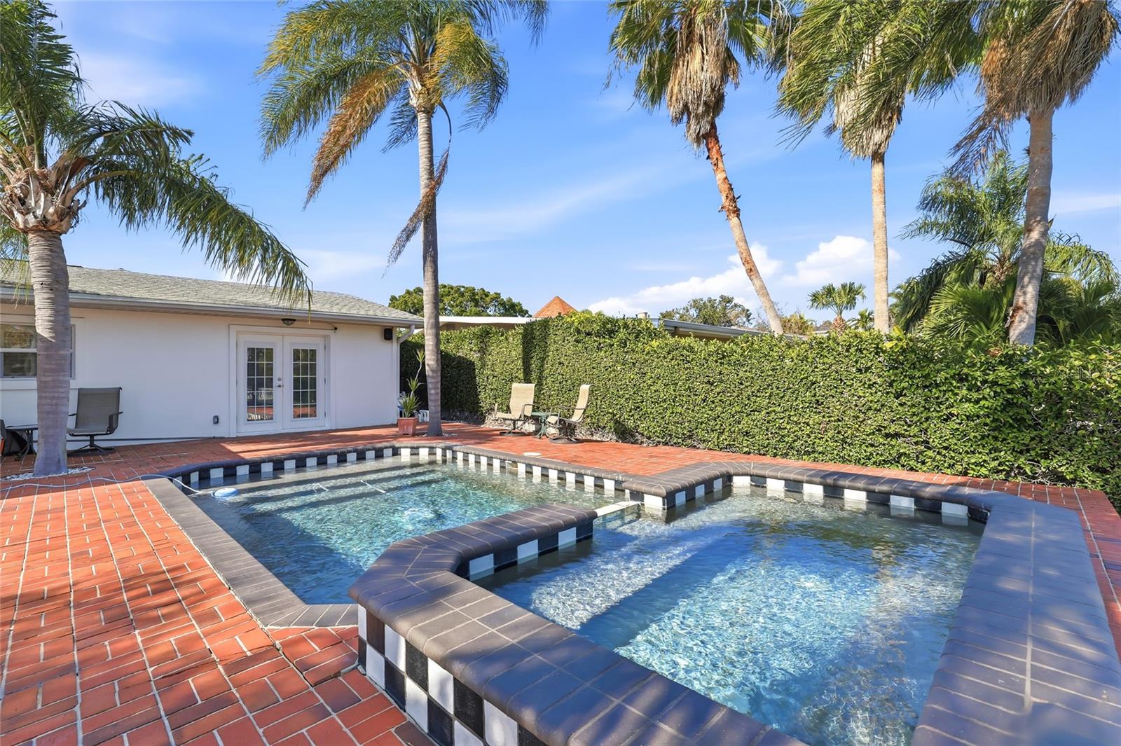 Backyard, Pool and Hot Tub on Brick Deck/Patio
