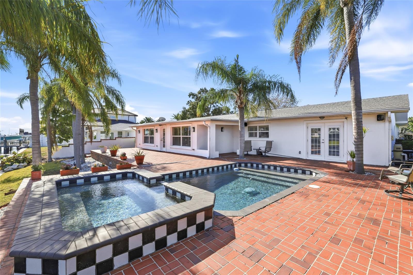 Backyard, Pool and Hot Tub on Brick Deck/Patio