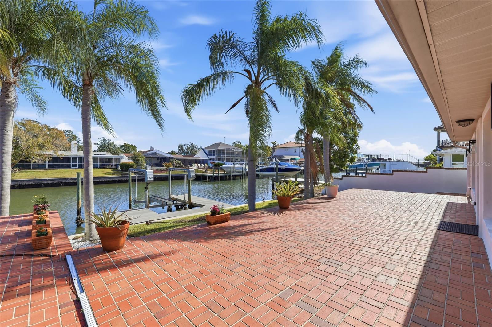 Backyard, Brick Patio and Canal/Dock/Boat Lift