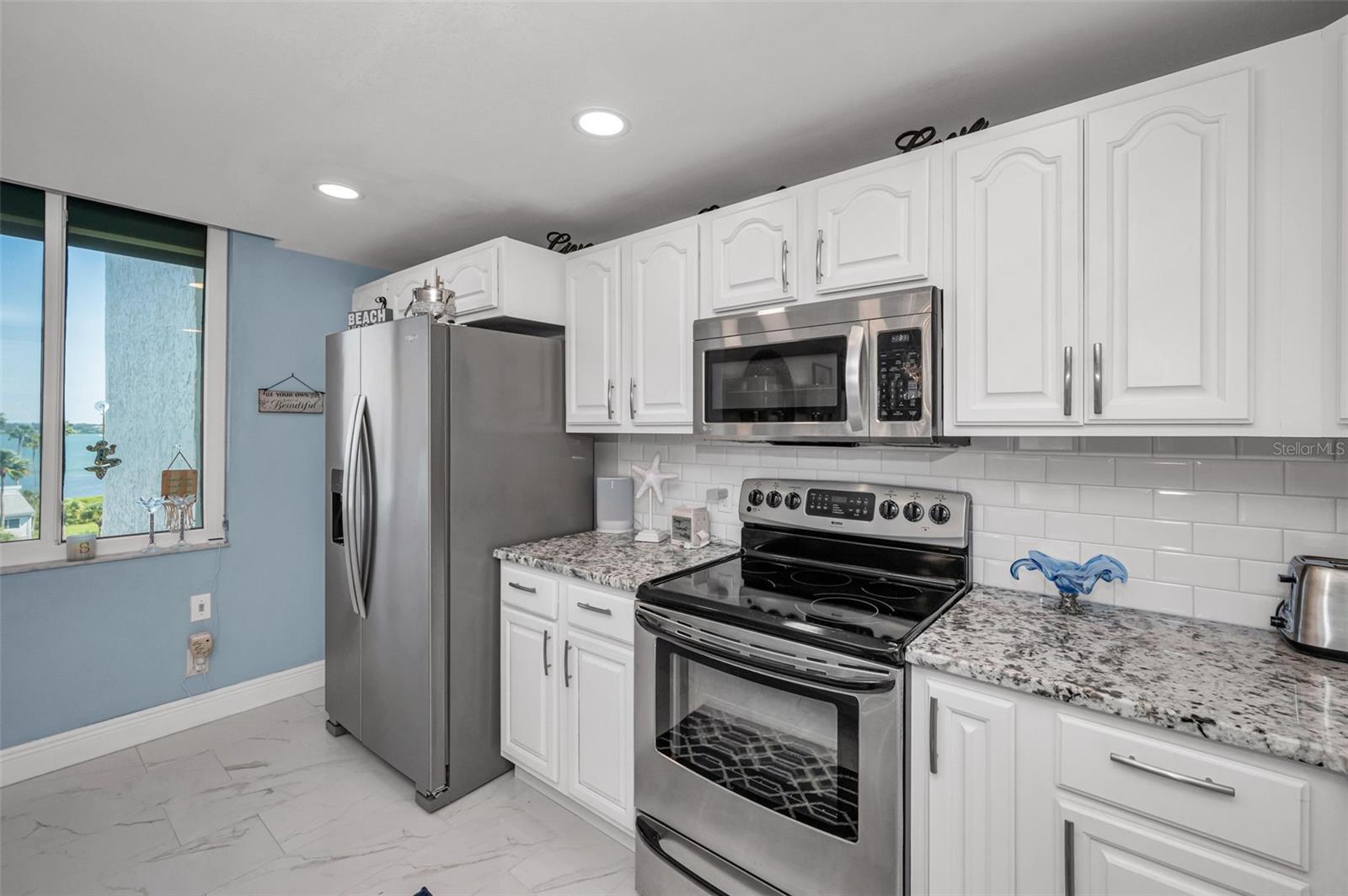 Light & Bright Cucina Captures an Abundance of Natural Light & Seascapes!