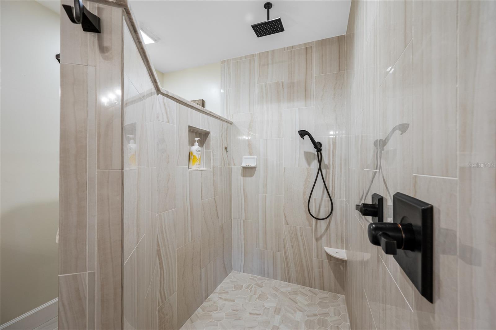 Primary Walk In Shower - Venetian Bronze Fixtures