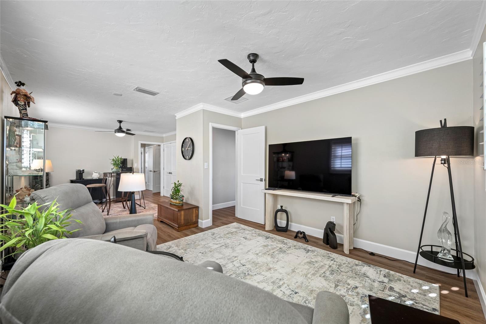 Bedroom #3 currently being used as a sitting room and a coffee room - two separate entrances.  A wall/closet could be built to make this space into two separate bedrooms.