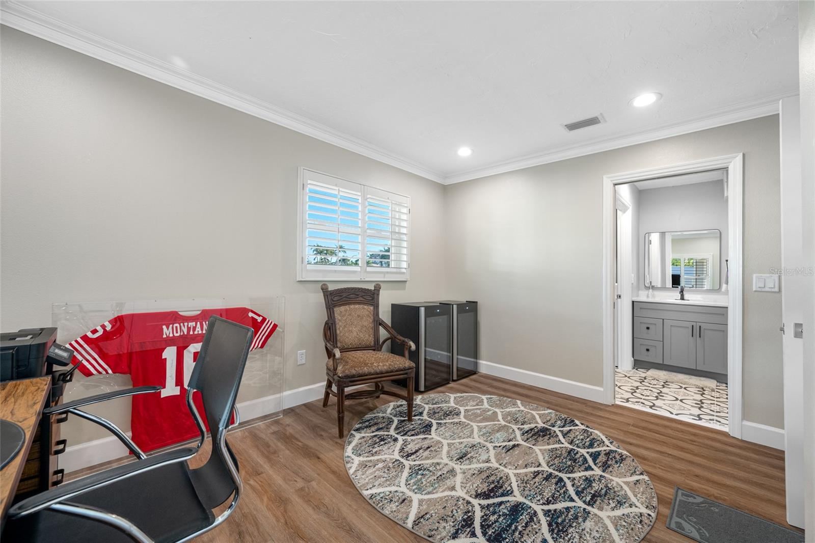 Bedroom #4 - Currently used as an office - Entrance to En-Suite Half Bath and Laundry