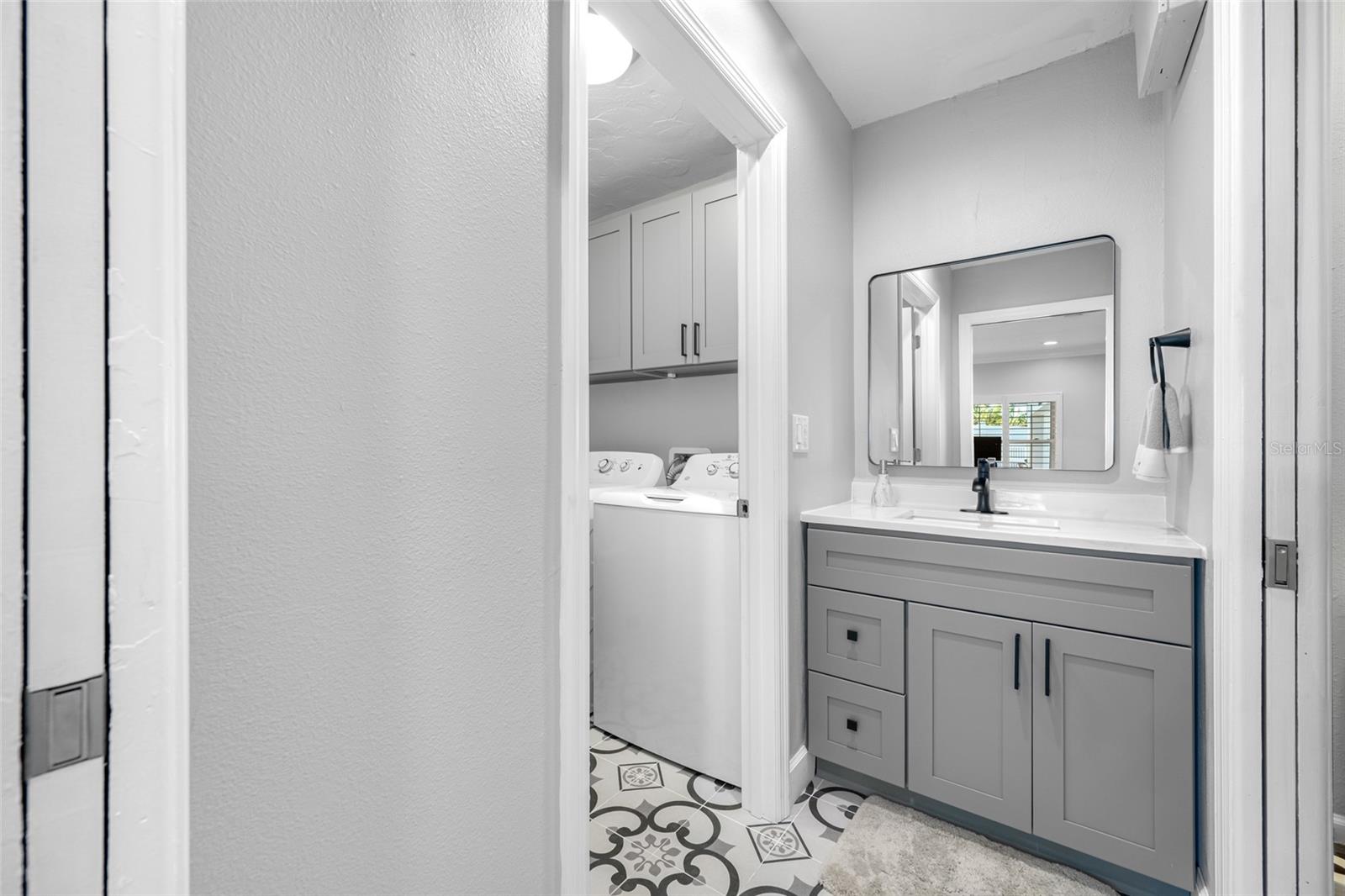 En-Suite Half Bath and Laundry Room off of Bedroom #4