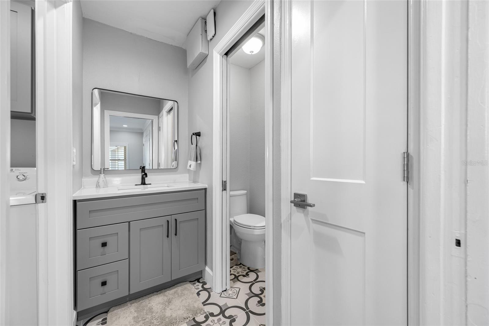 En-Suite Half Bath - the closet can be plumbed for a 3rd Shower