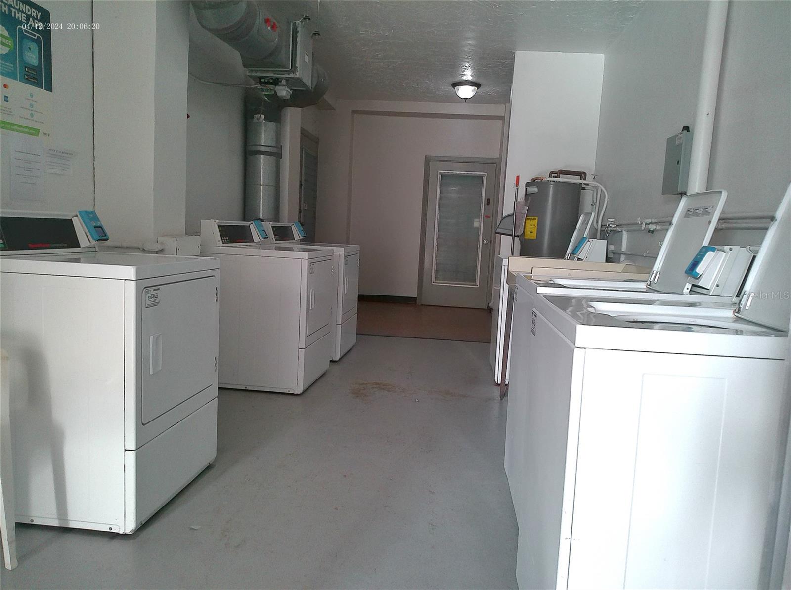 Laundry on the same floor, right outside of the back door.