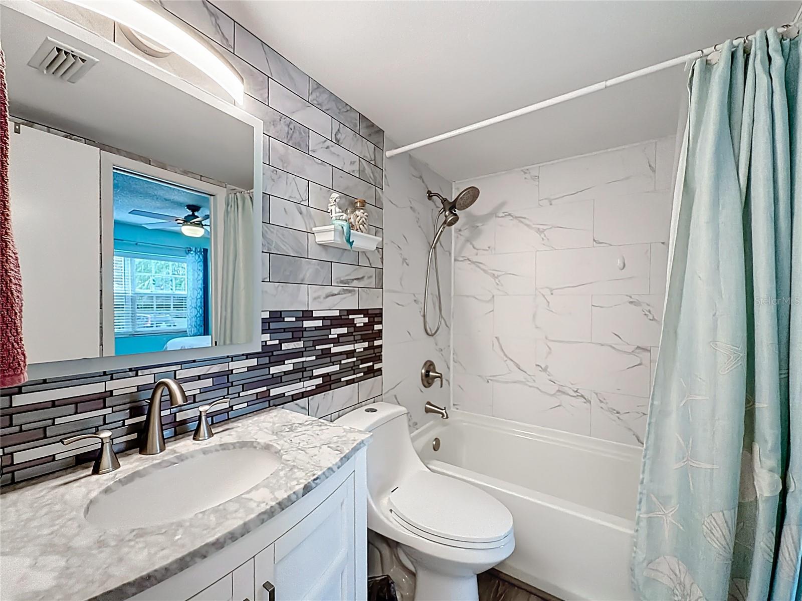 502 Bough Ave - hall bath, updated cabinets and tile