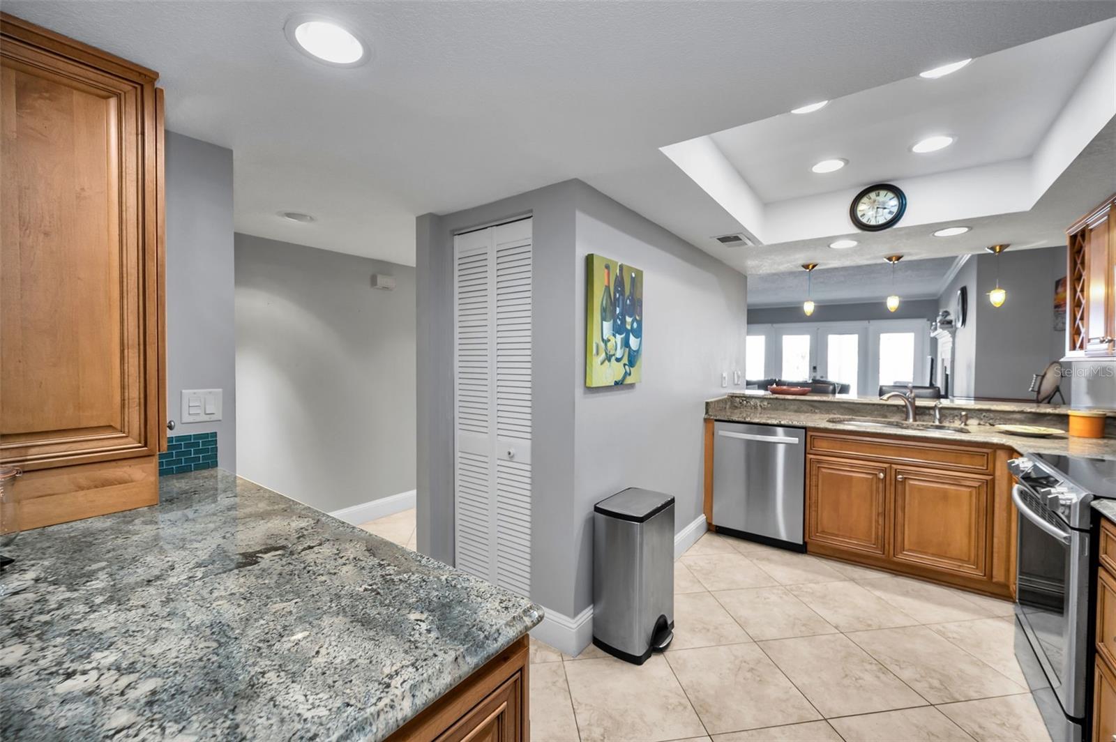 ... Nice Shot of Updated Kitchen.. New A/C Located Behind White Bifold Doors.