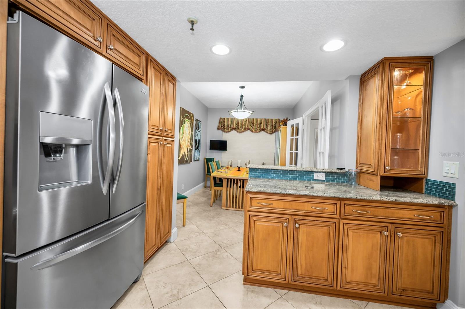 ... Easy Access From Dining Room To Kitchen.