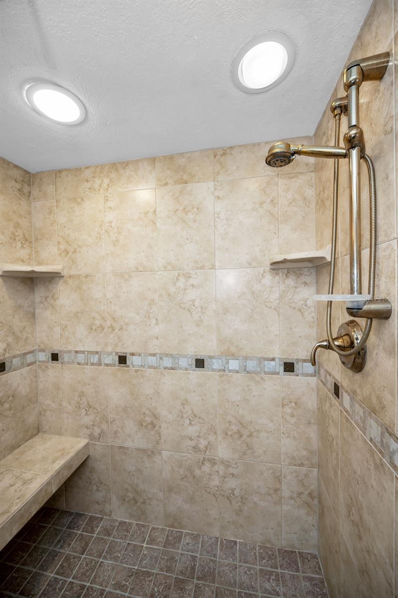 .. Walk in Shower With Bench. Nice Professional Tile Work.