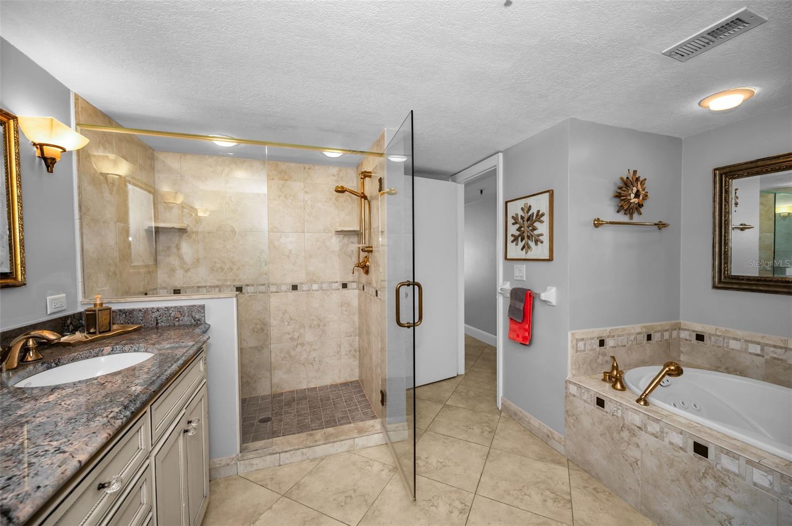 ... View Of Master Bath Looking Out Toward Hallway. Once Again This Large 2/2 With 1410 Sq FT Allows Extra Space in All The Rooms Including the Master Bath.
