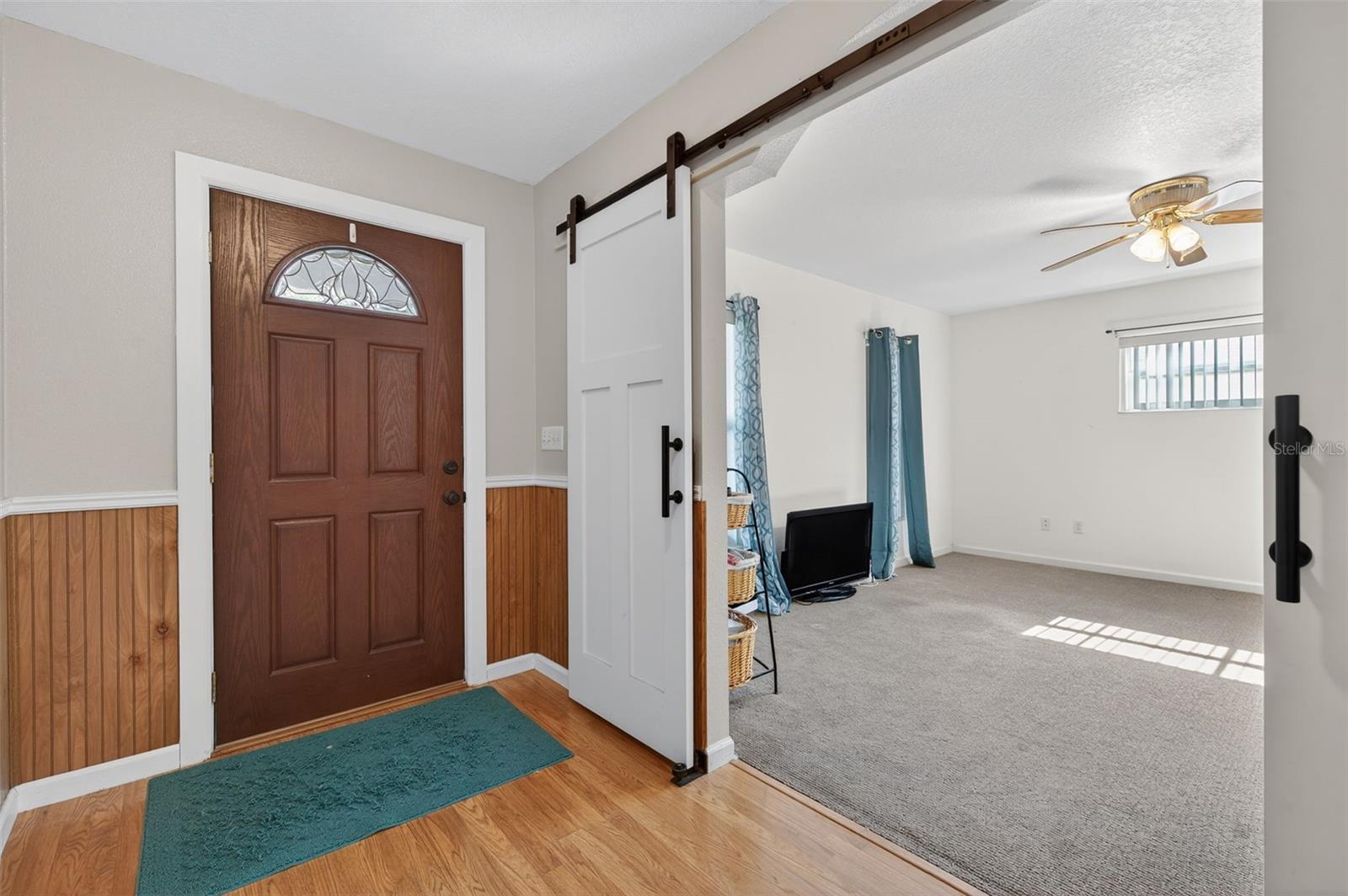 This room would make a great living room, office, or was also used as a 4th bedroom.