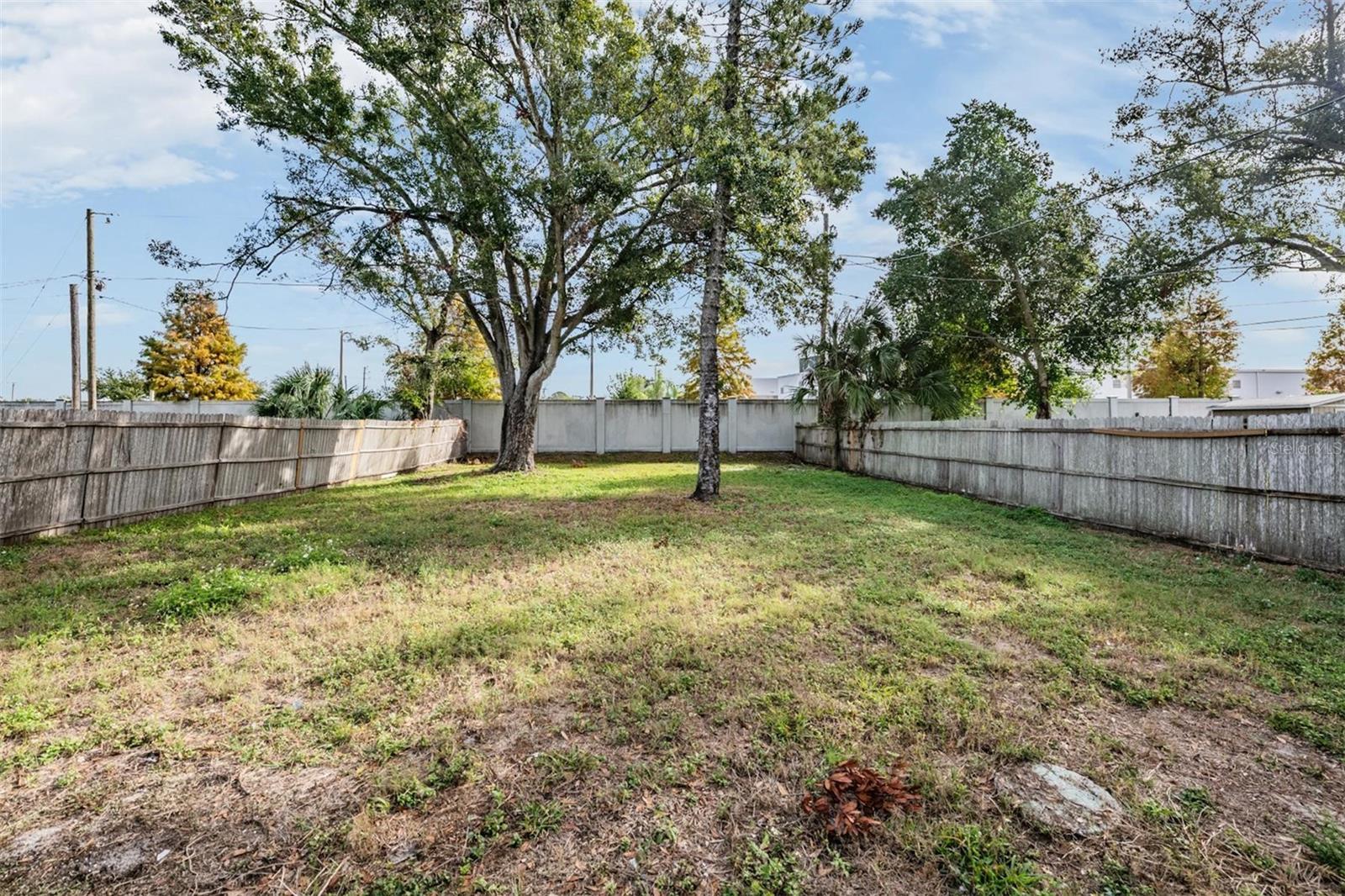 Completely fenced backyard.