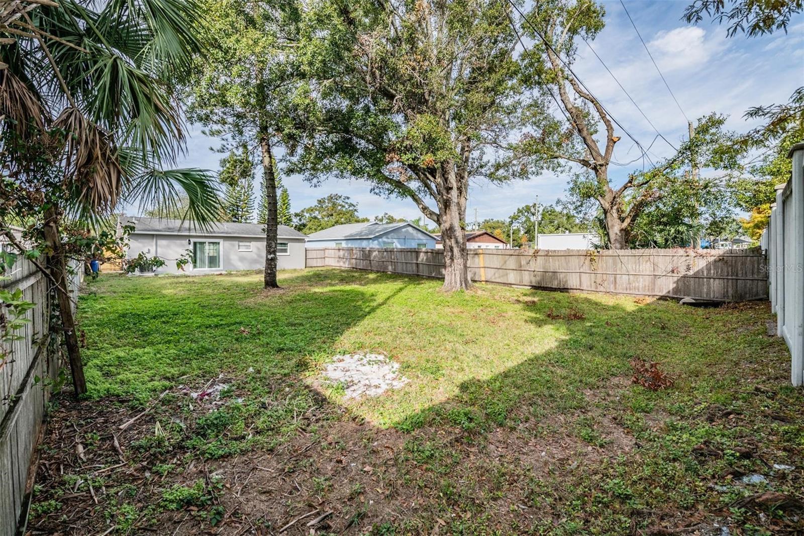 Completely fenced backyard.