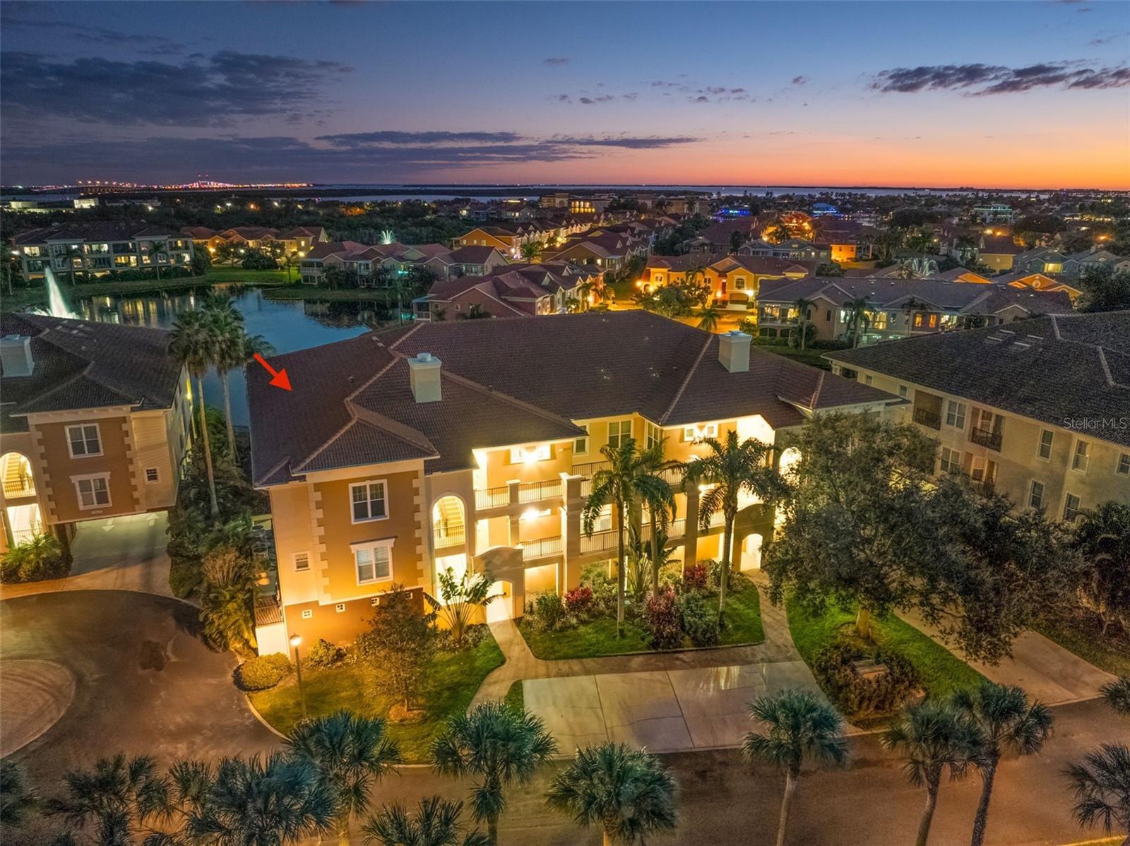 Partial view of the Marina Bay community at dusk, with the Sunshine Skyway Bridge on the horizon.