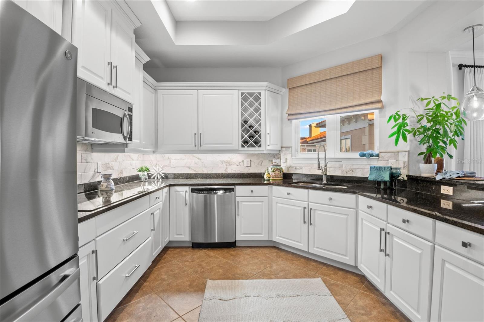 Large, beautiful Kitchen with substantial counter space and cabinetry.