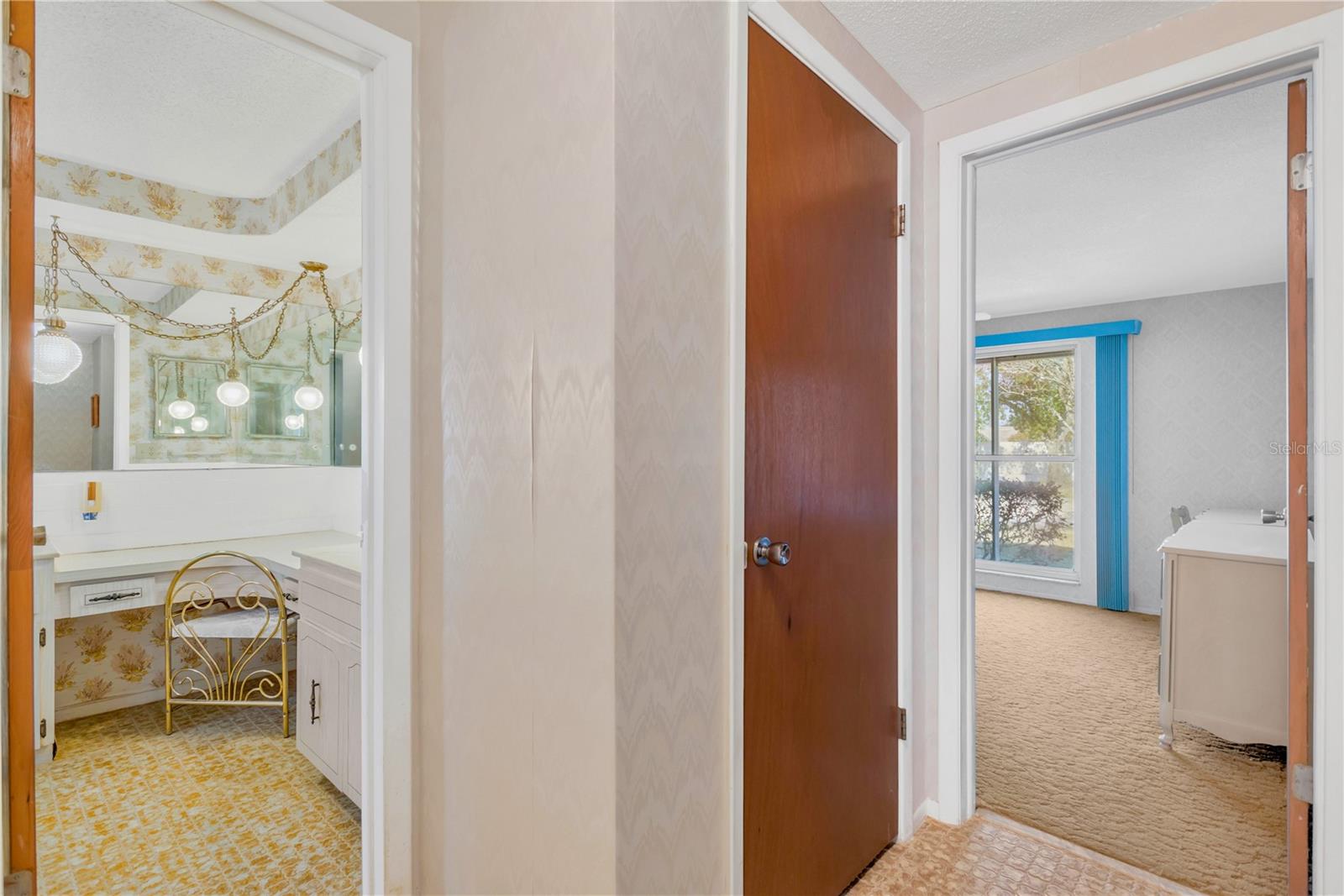 View from hallway into Ensuite bathroom and the Guest bedroom