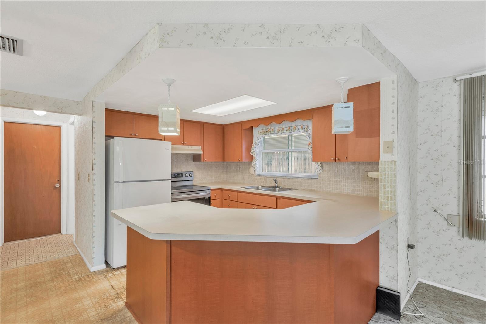 View of Kitchen with room for bar stools at the peninsula