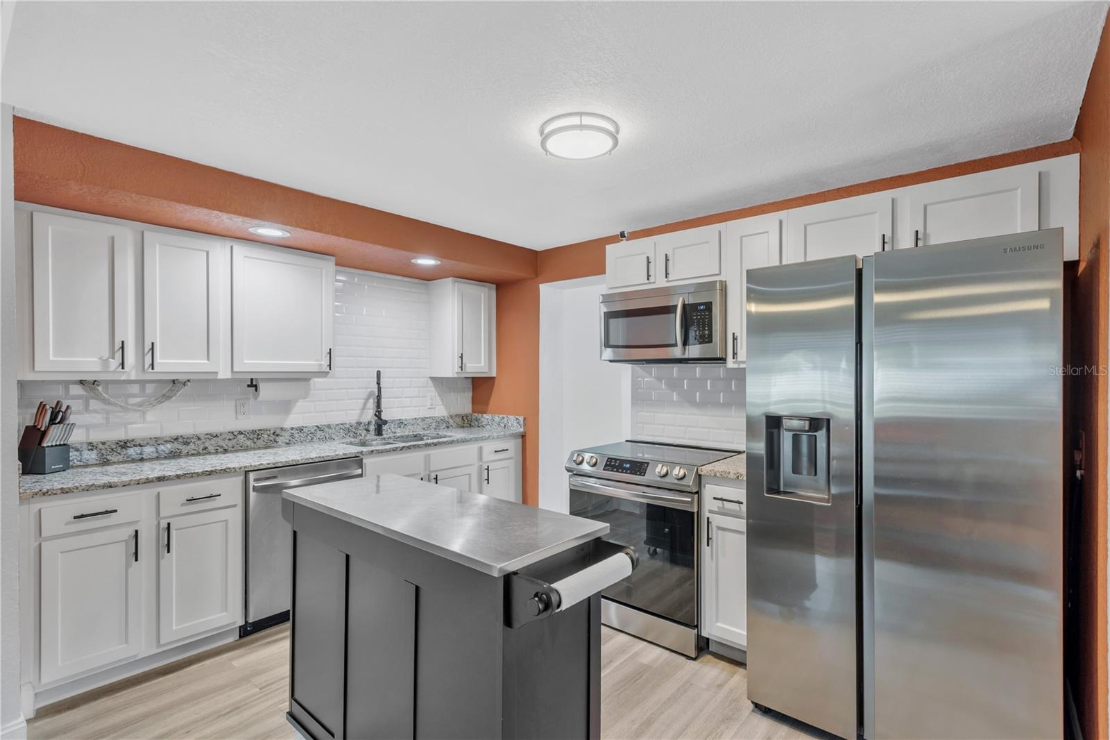 View of the Kitchen with mobile kitchen island