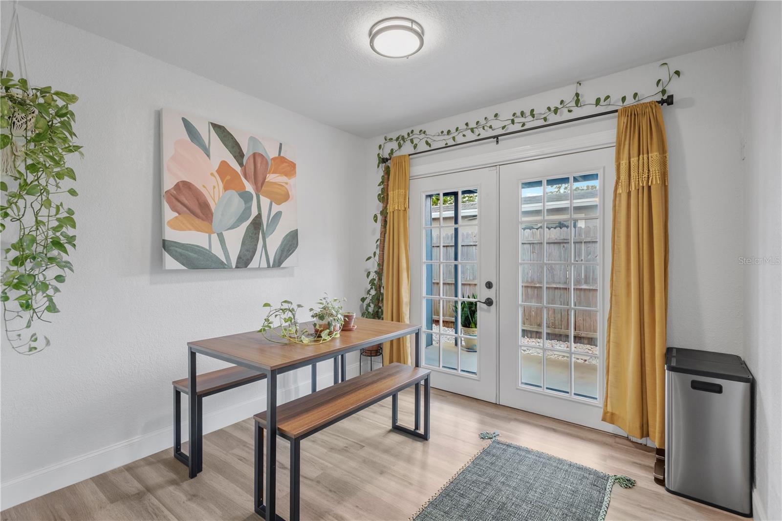 Dining room view with French doors to access side yard