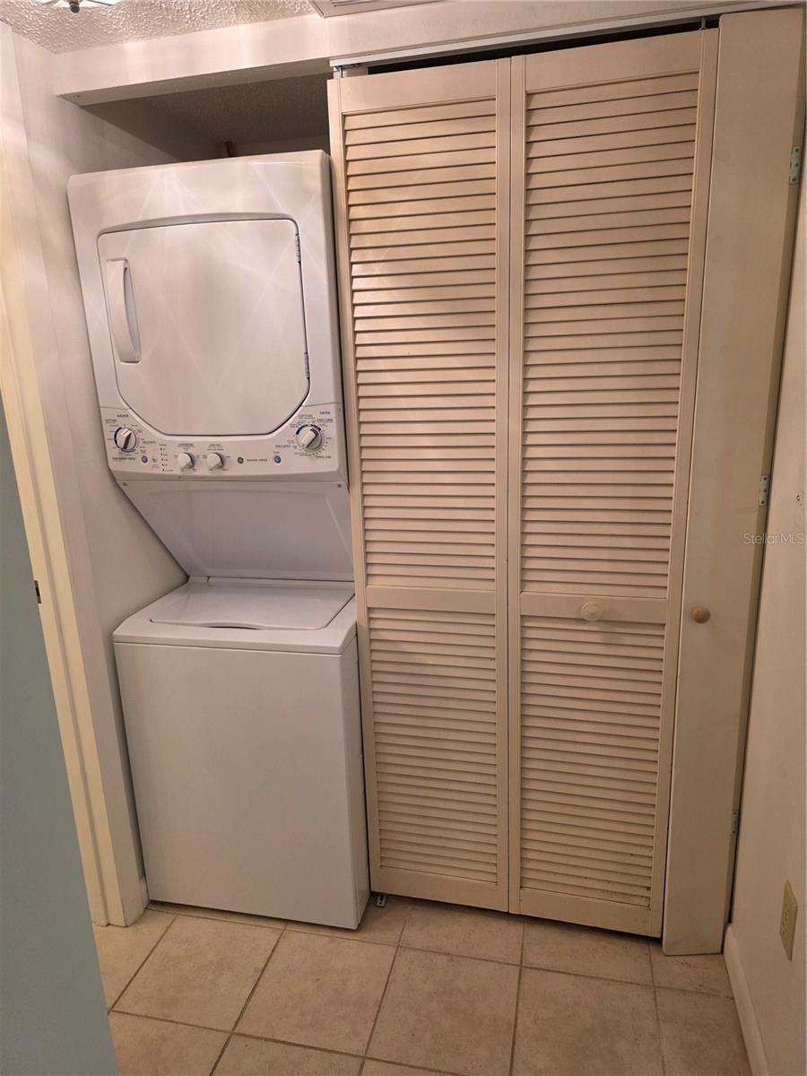 Large storage closet with central air and heat unit.