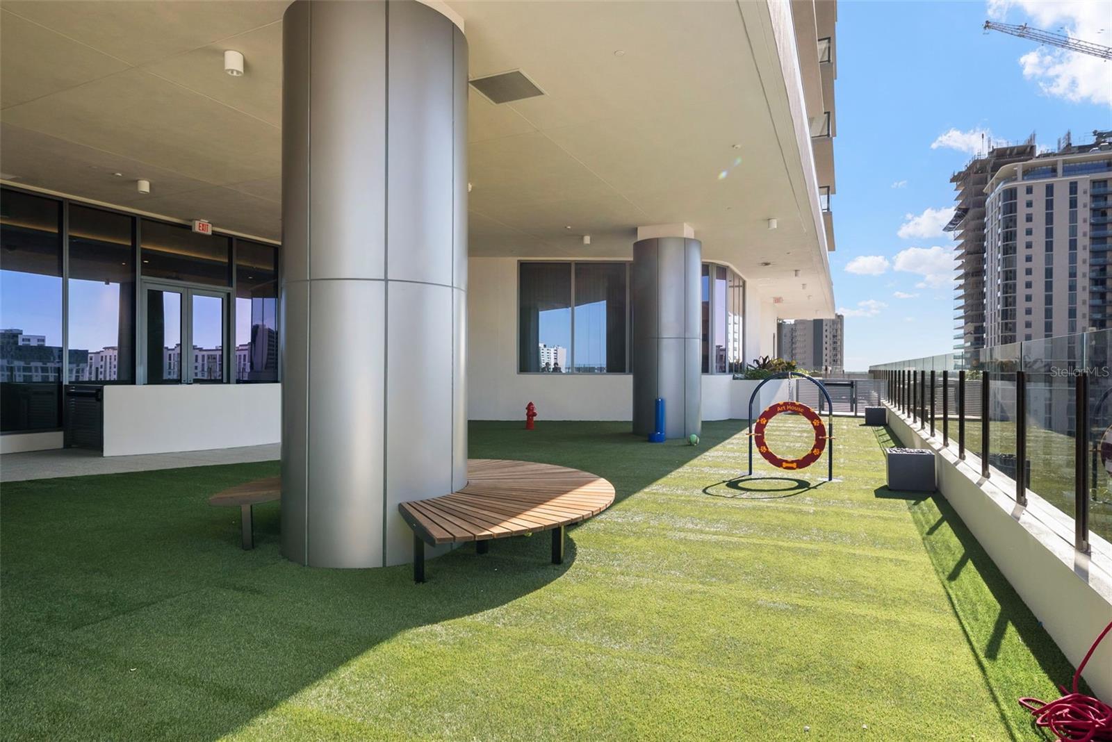 Dog Park with pet-relief turf.