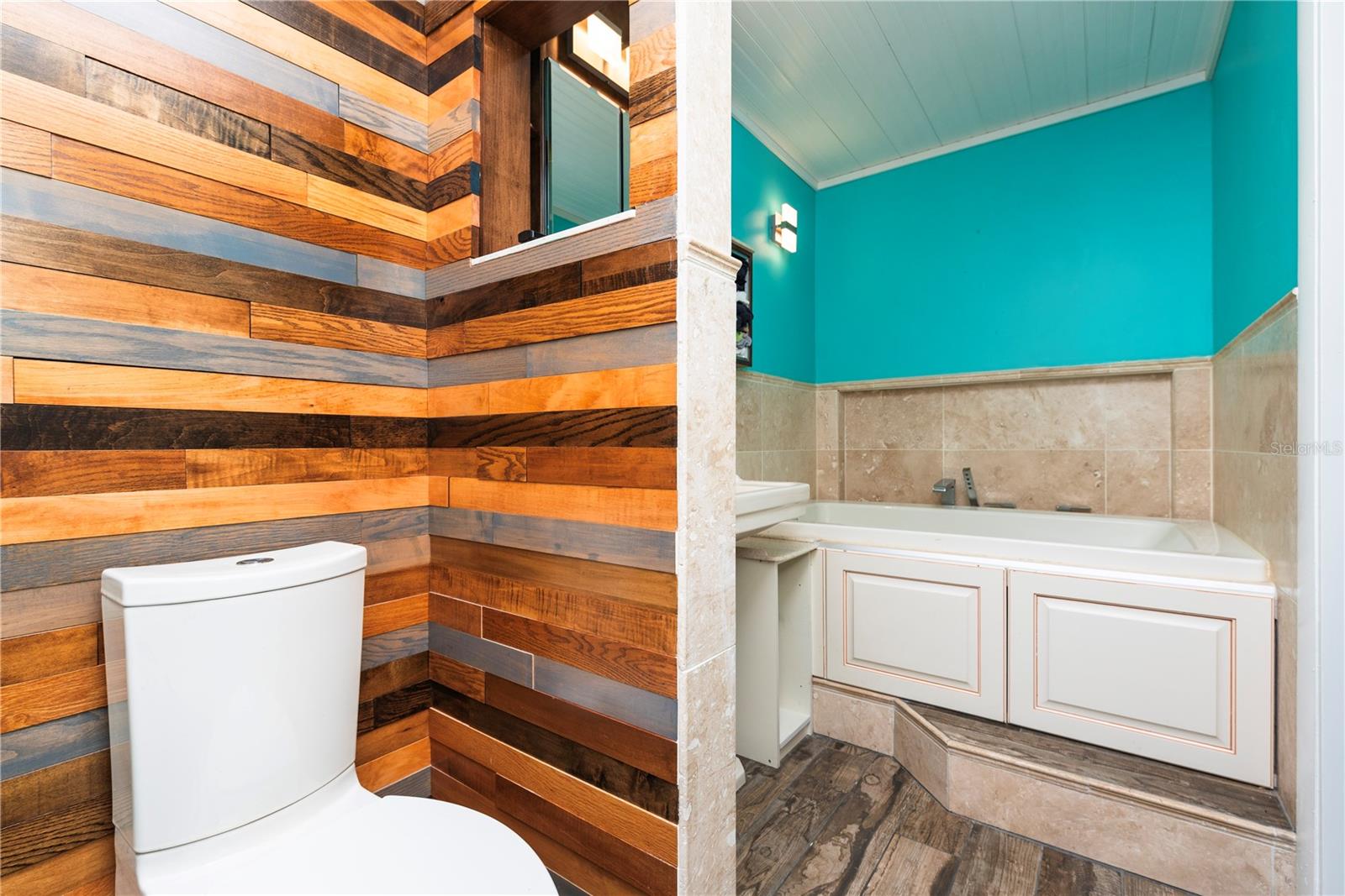 Primary bathroom with separate tub.