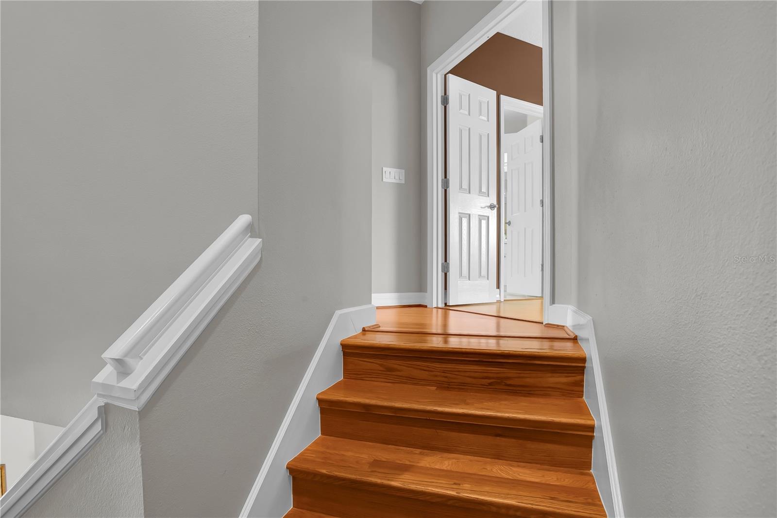 Stairs leading to bedrooms