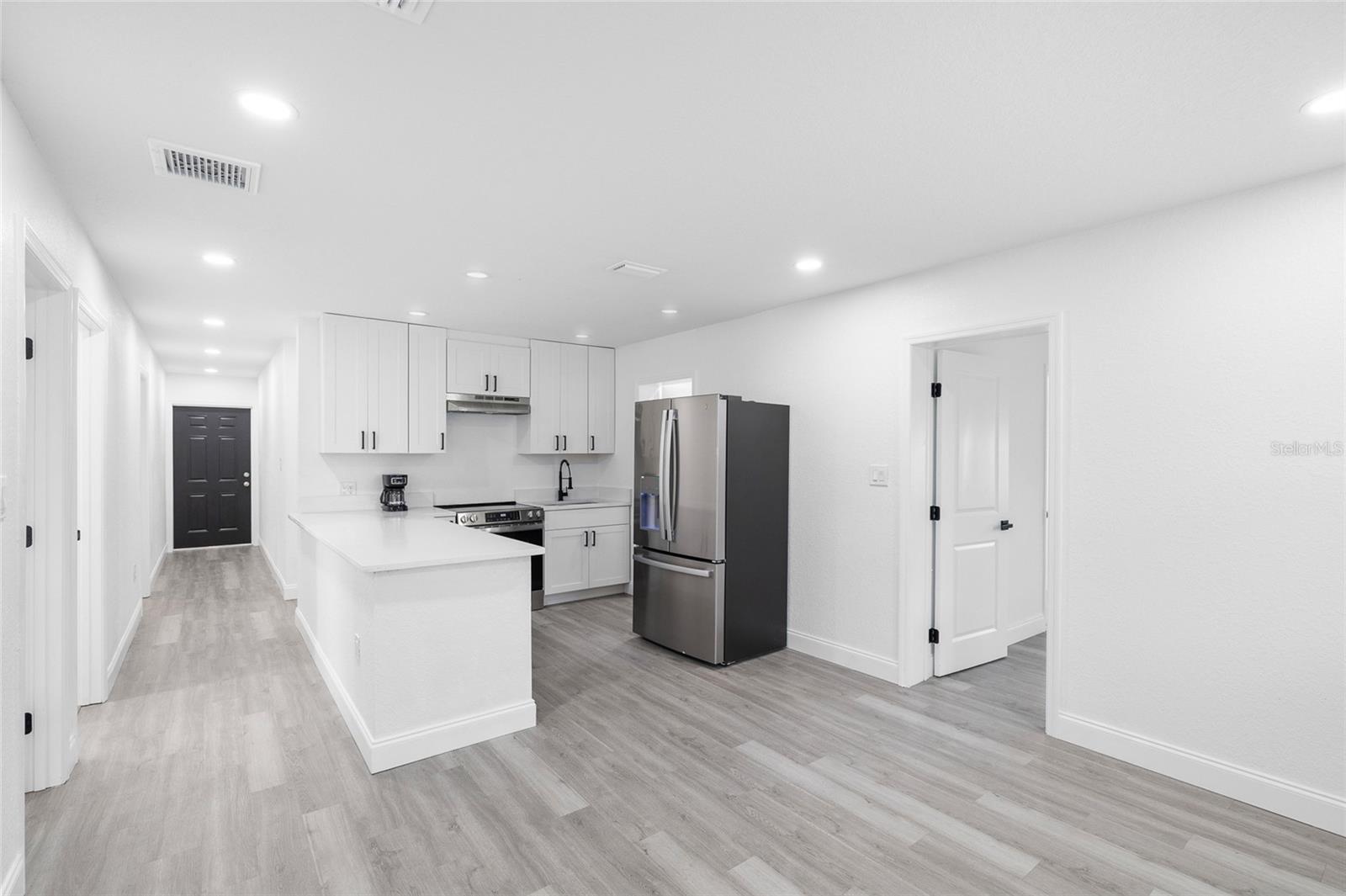 Kitchen with Primary Bedroom to Right