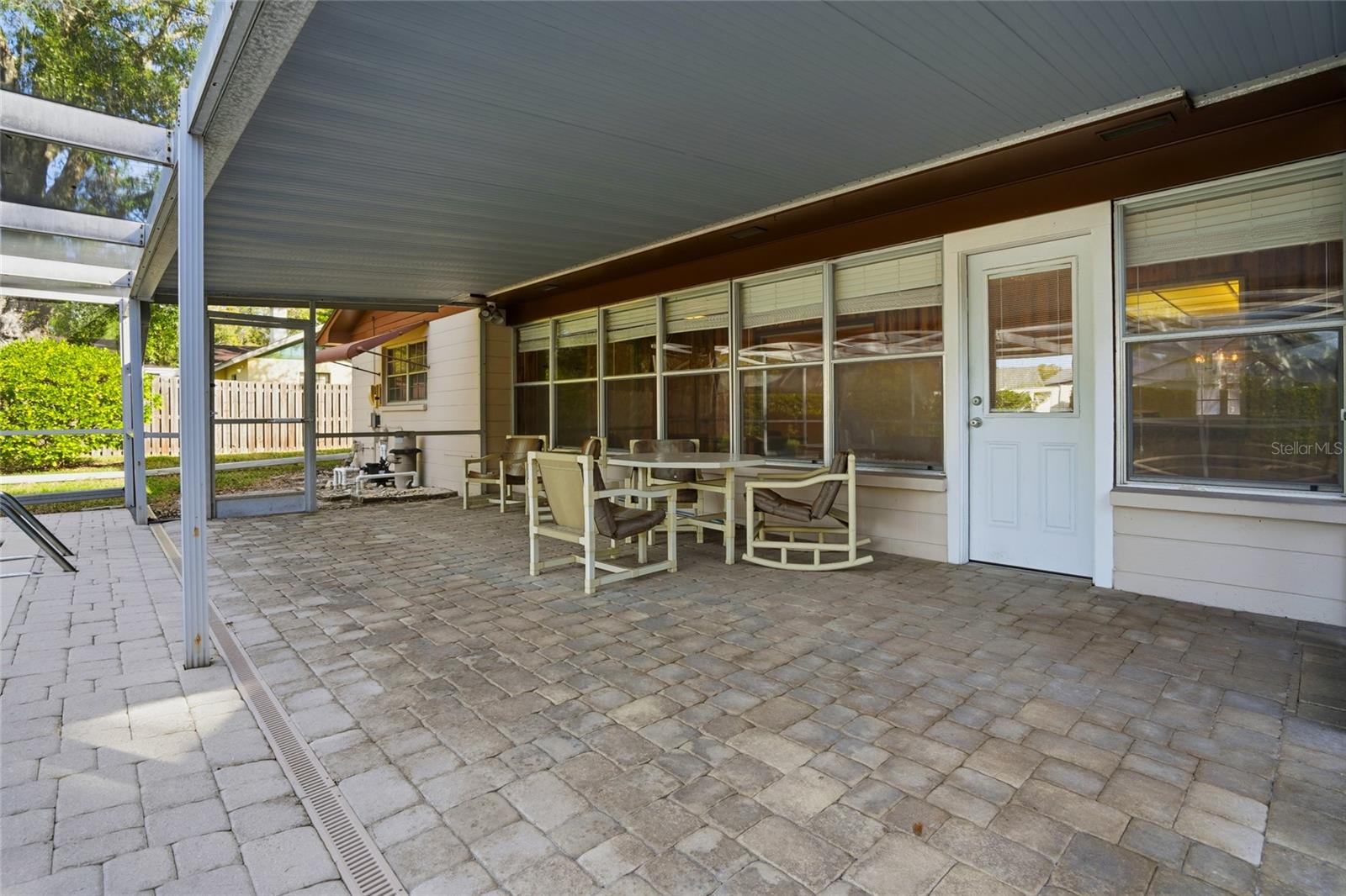 beautiful pavers and wall of windows