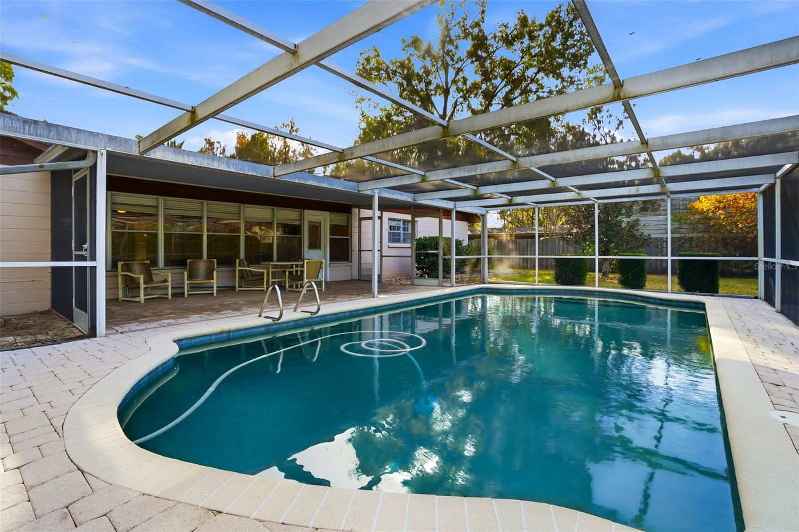 Beautiful pebble finish on this sparkling pool