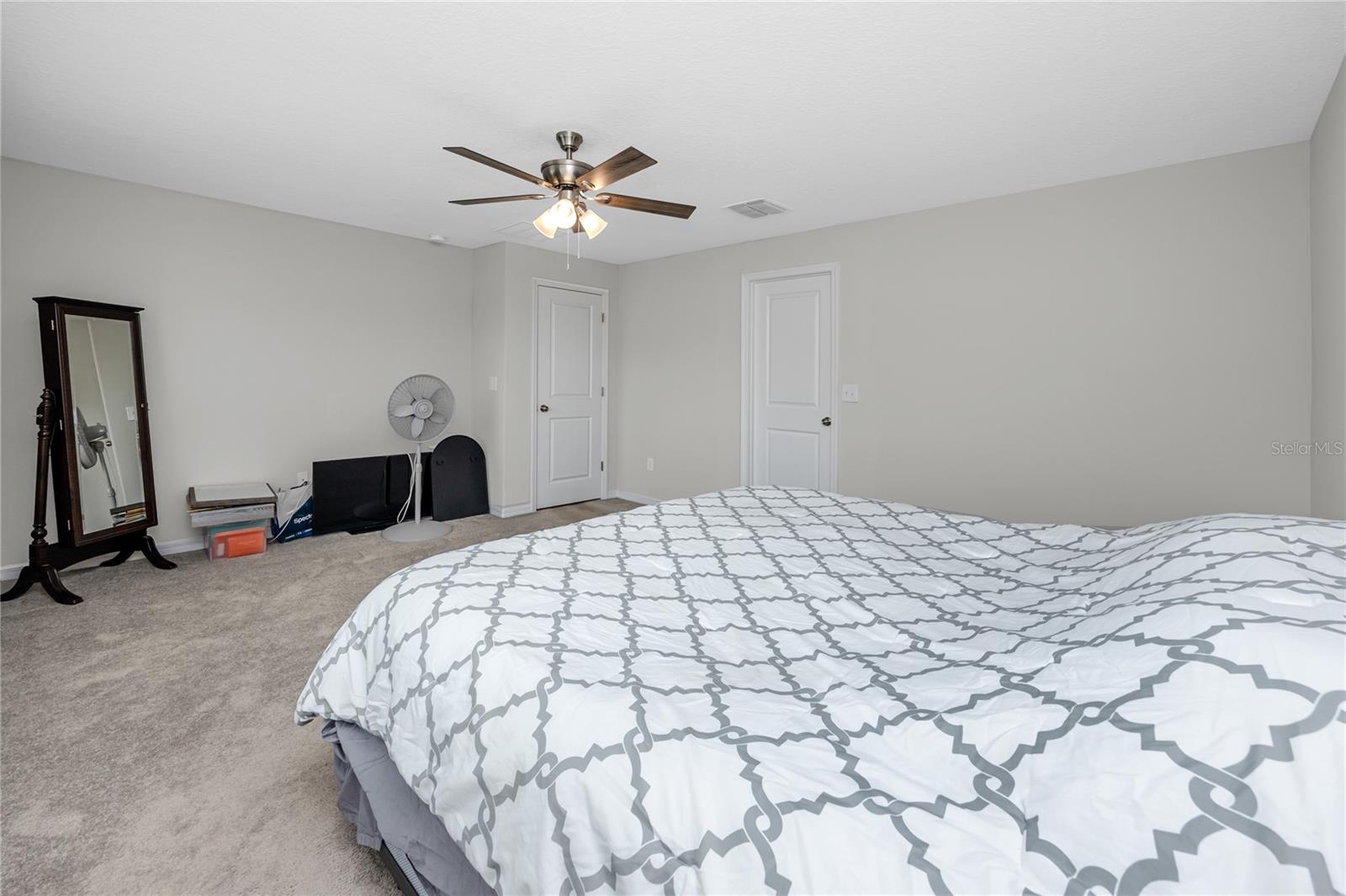 Plenty of room for a king sized bed and sitting area, or additional furniture, TV stand, workout space, or desk.