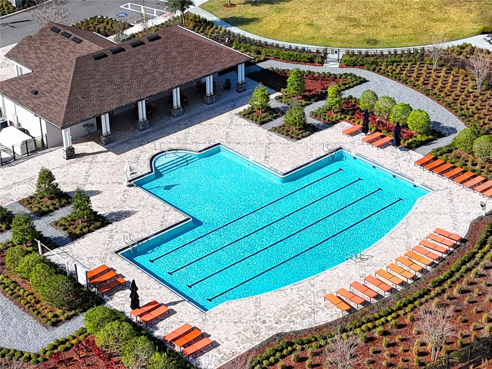This development offers amenities to enjoy Florida's year-round sun! Community center with pool, grill area, basketball court, and playground! Imagine getting your morning swim in this beautiful pool with the Florida sun on your face instead of shoveling snow!