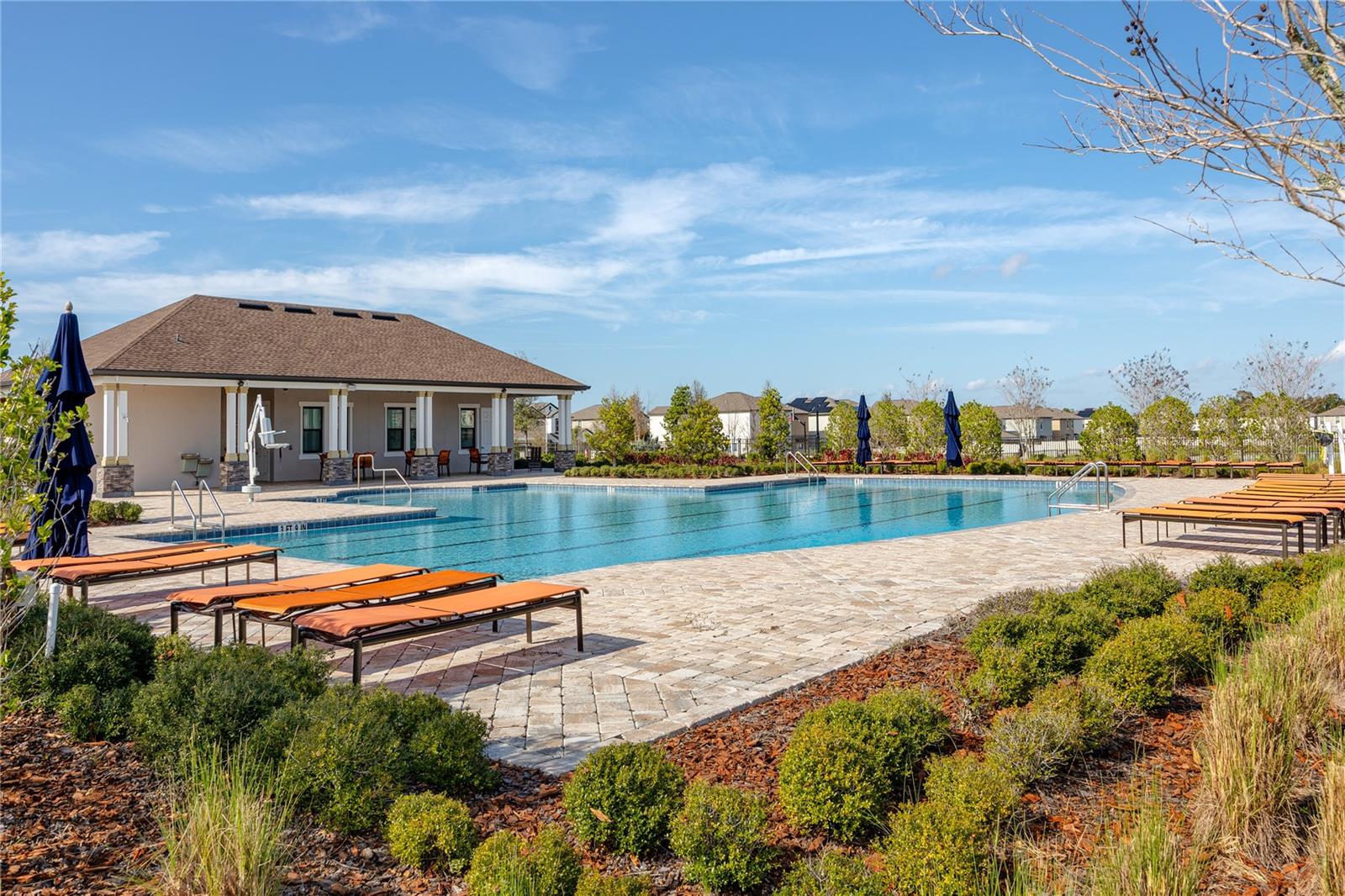 Lap pool with expansive sun deck, perfect for enjoying the FL sun!