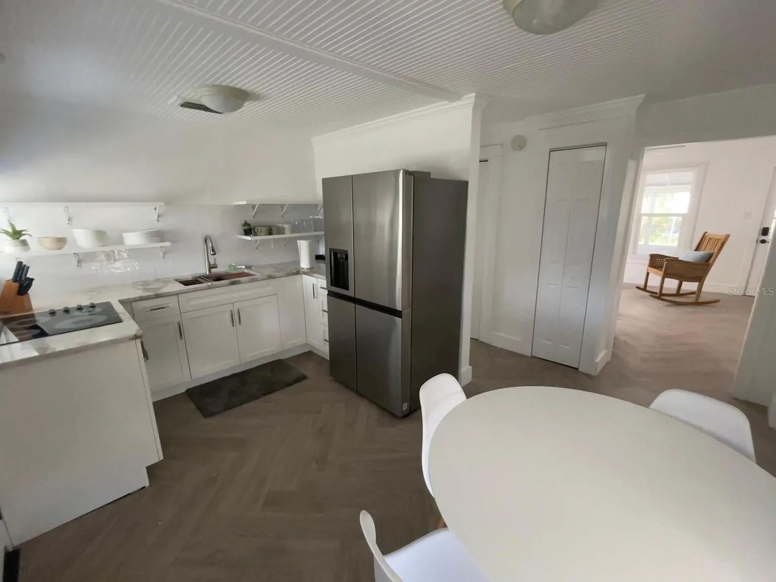 Kitchen with view into the living room