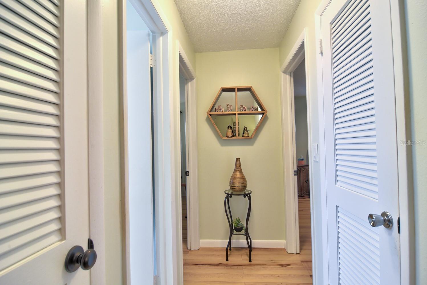 Hallway with Storage Separating the Bedrooms