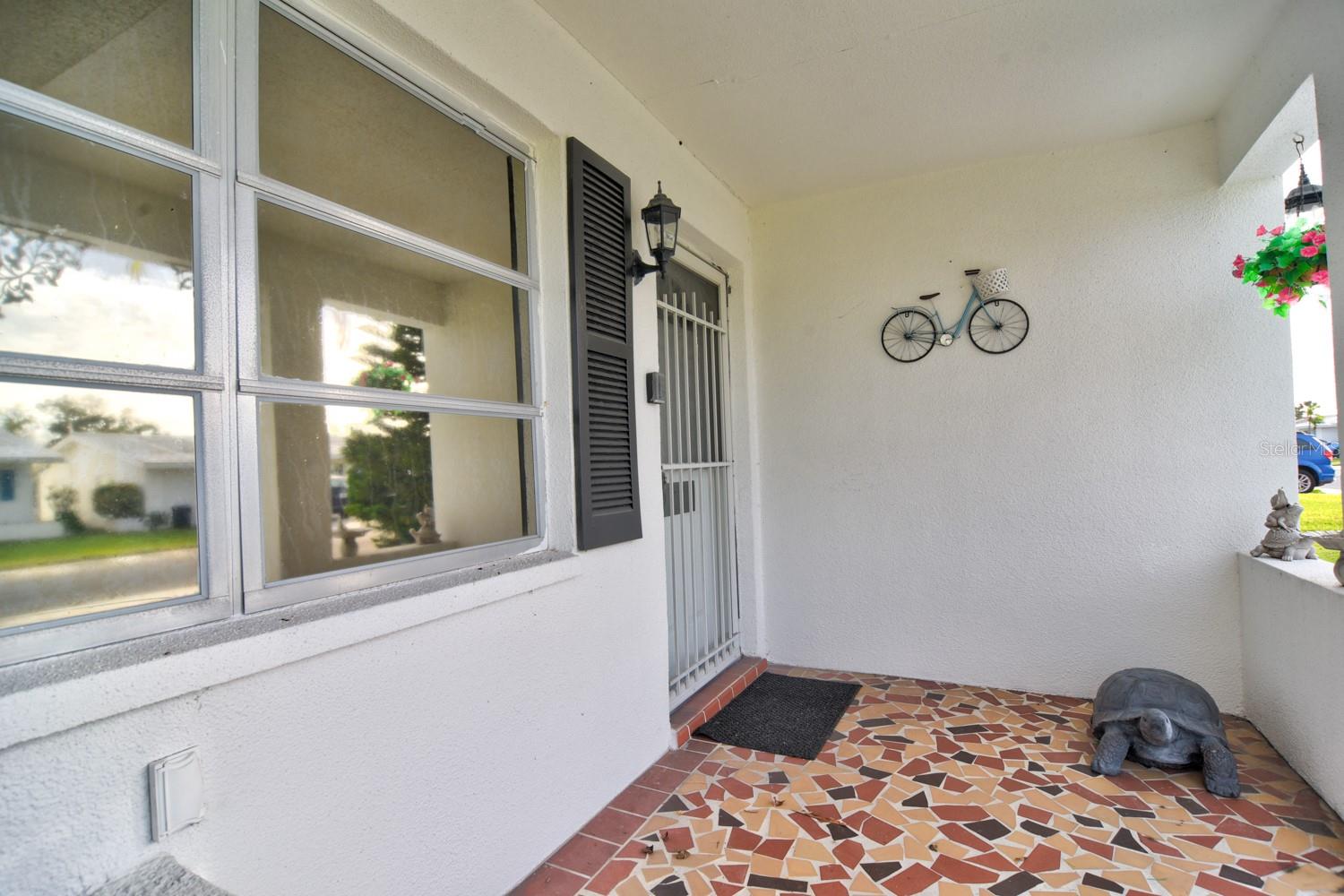 Front Patio with Mosaic Tile Flooring