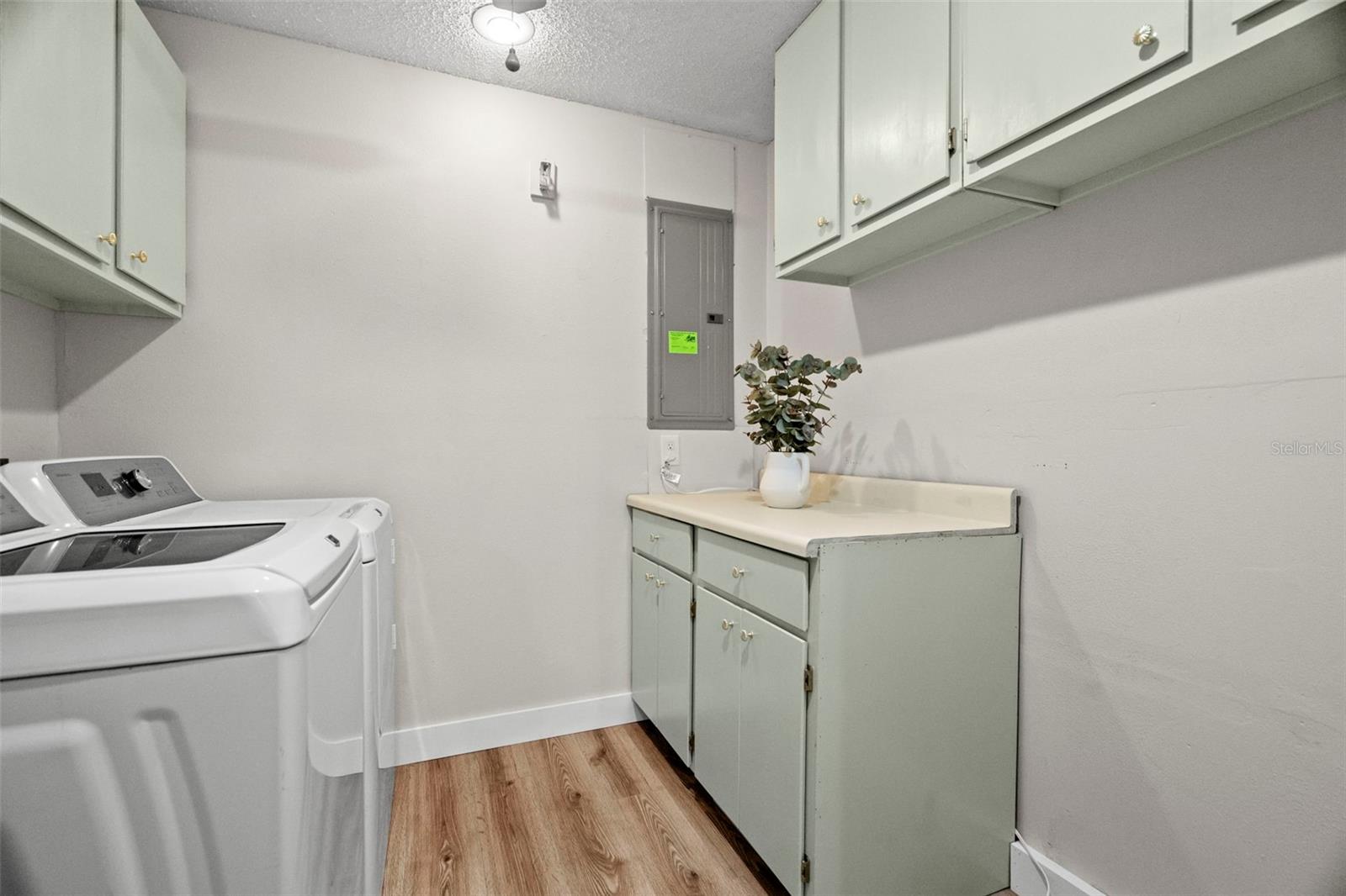Utility Room off Kitchen and Garage