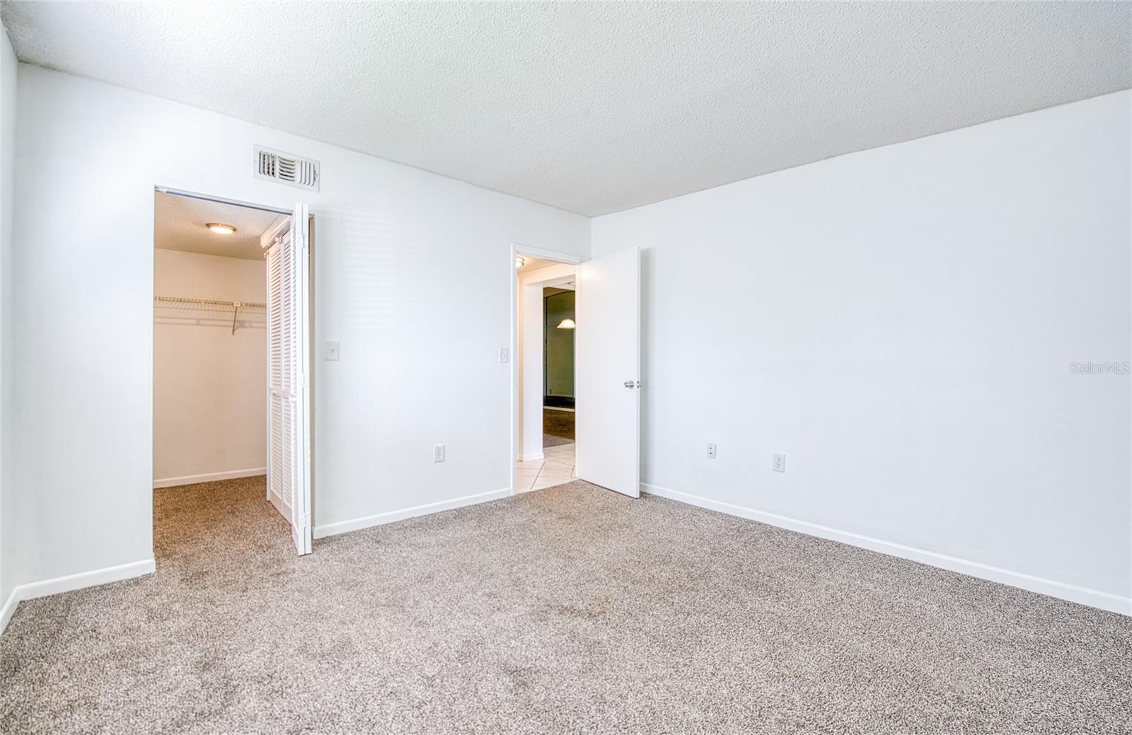 Guest Bedroom is located off the entrance hallway.