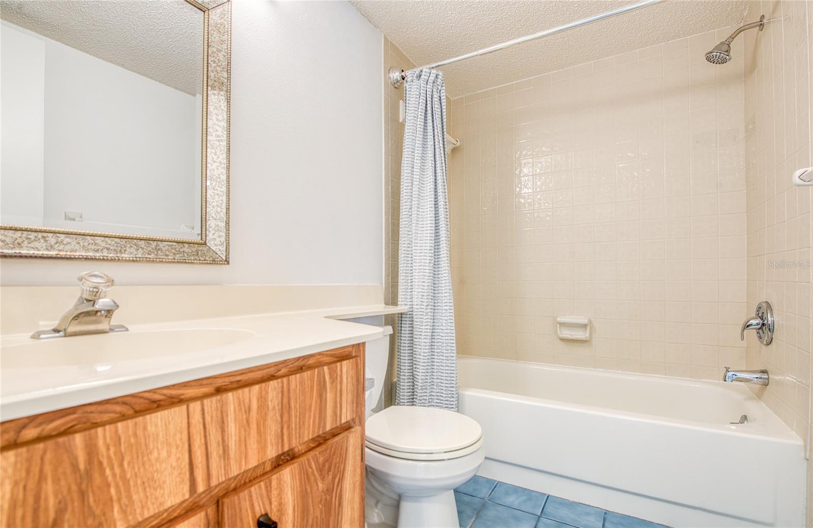 Guest Bathroom has a Shower/Tub.