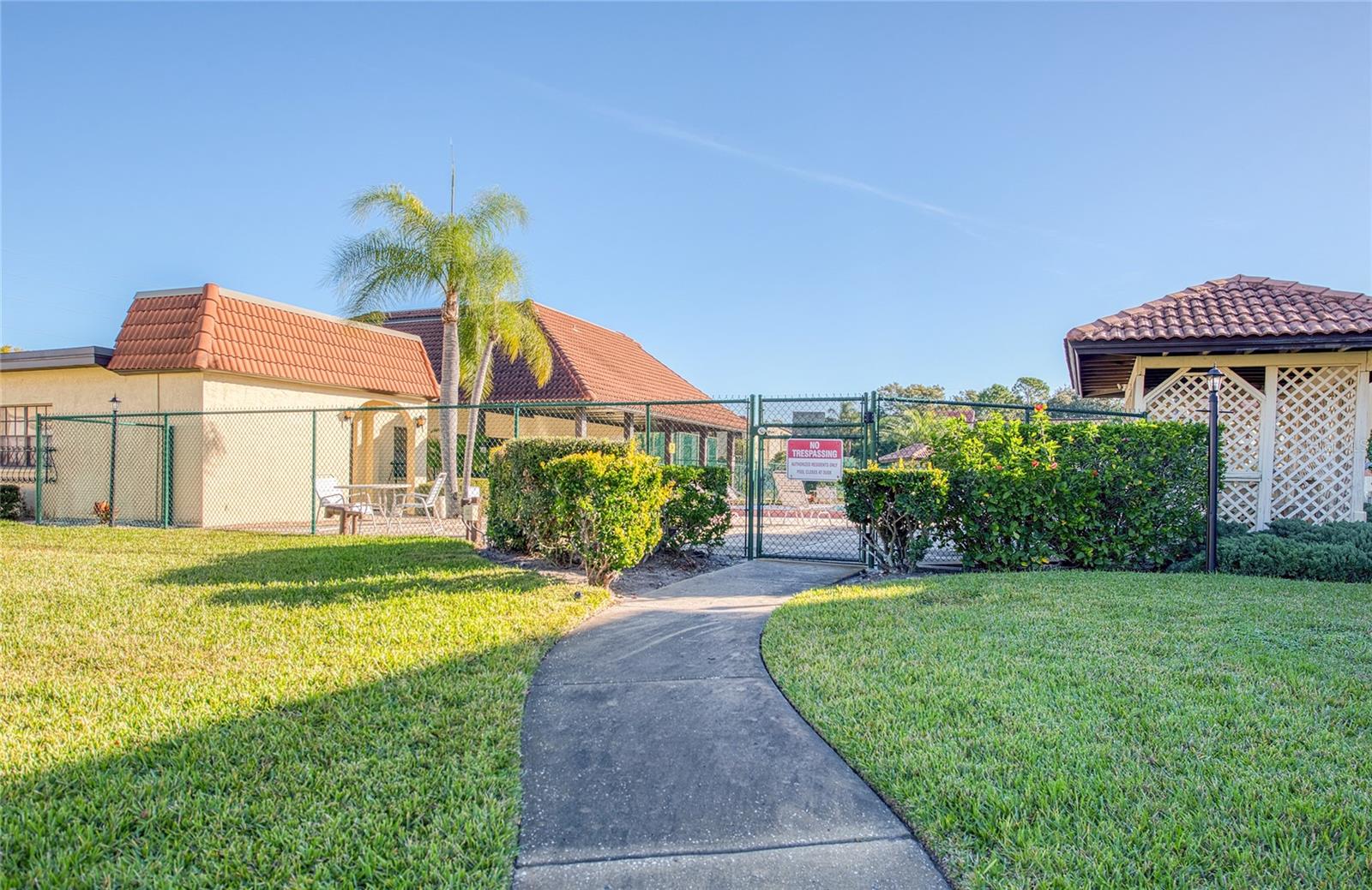 leads to an association Clubhouse, Pool and Hot Tub.