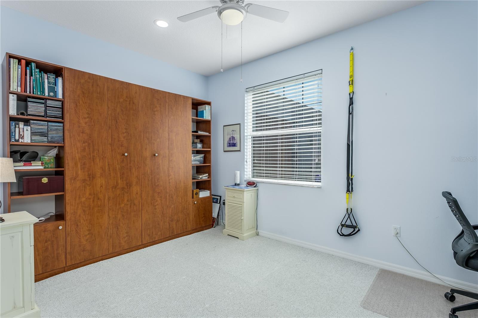 Guest bedroom with closed murphy bed