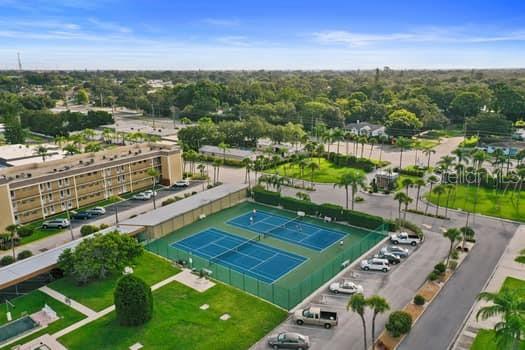 TENNIS/PICKLE BALL COURTS GREEN LAWNS GATED COMMUNITY